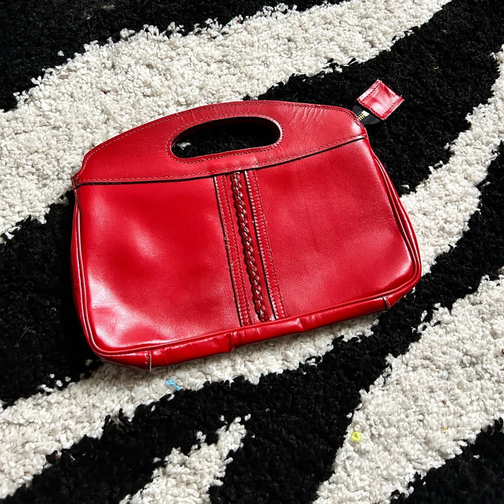 Red thrifted clutch handbag